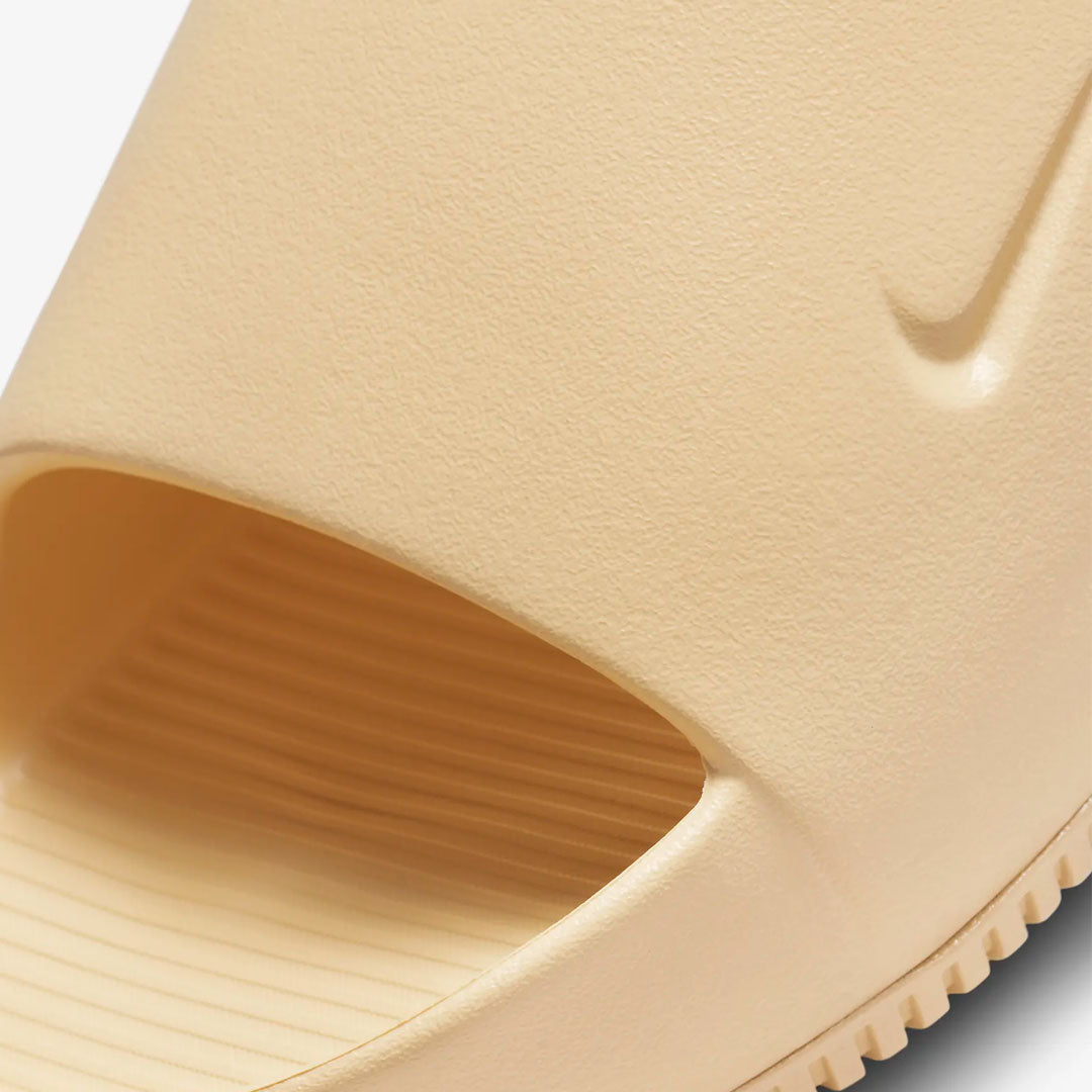 Slides Nike Calm en beige