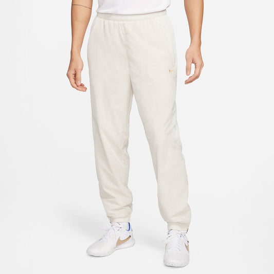 Pantalón Nike Culture of Football en beige