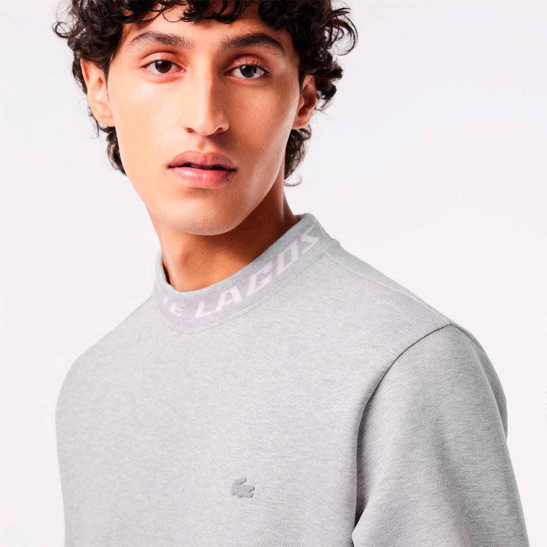 Buzo Lacoste Collar en gris