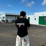 Camiseta Nude Project Locally Cherry en negro