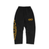 Pantalón Corteiz Superior Royale en amarillo